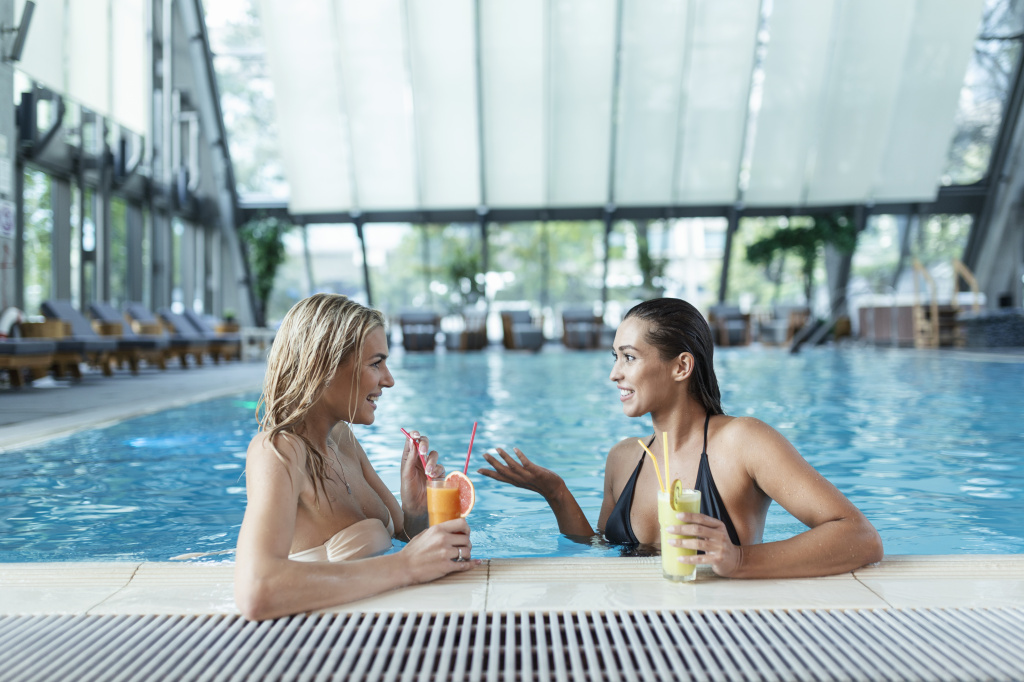 poolside-friends-relaxing-having-healthy-drinks-sensual-young-women-relaxing-in-spa-swimming-pool-spa-indoor-pool.jpg
